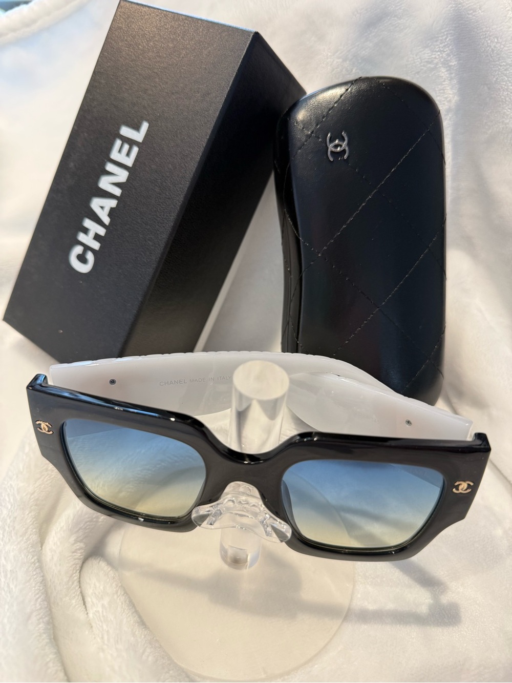 CHANEL Black Frame Sunglasses with Blue Gradient Lenses and Gold CC Accents